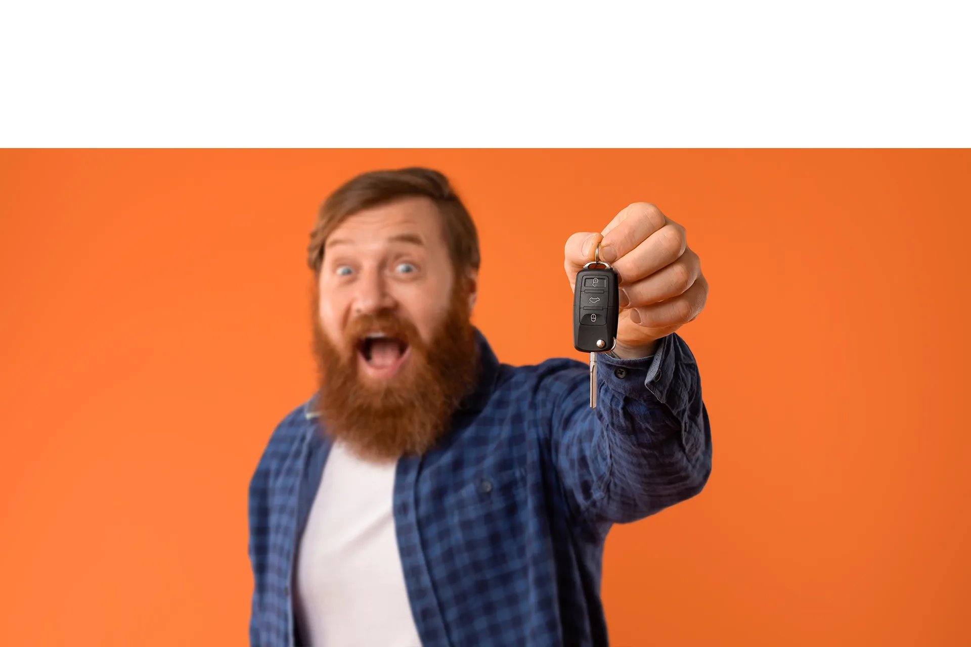 Happy man holding car keys after selling his vehicle through LetGoRide — fast, easy car selling with cash offers and free pickup.